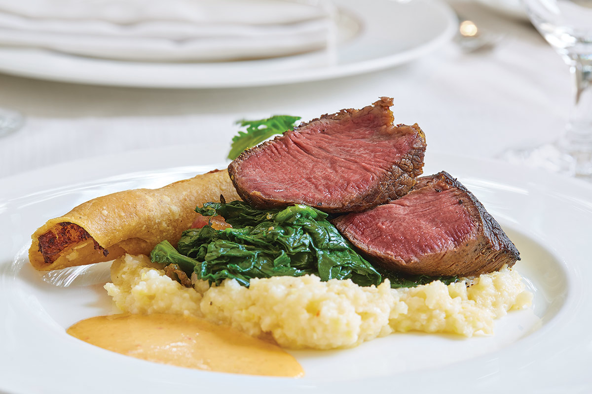 Fearing’s Restaurant signature dishes BBQ Spiced Beef Filet & Chicken Fried Maine Lobster, Dry Aged Rohan Duck Breast, Texas Wagyu 7oz Tenderloin.